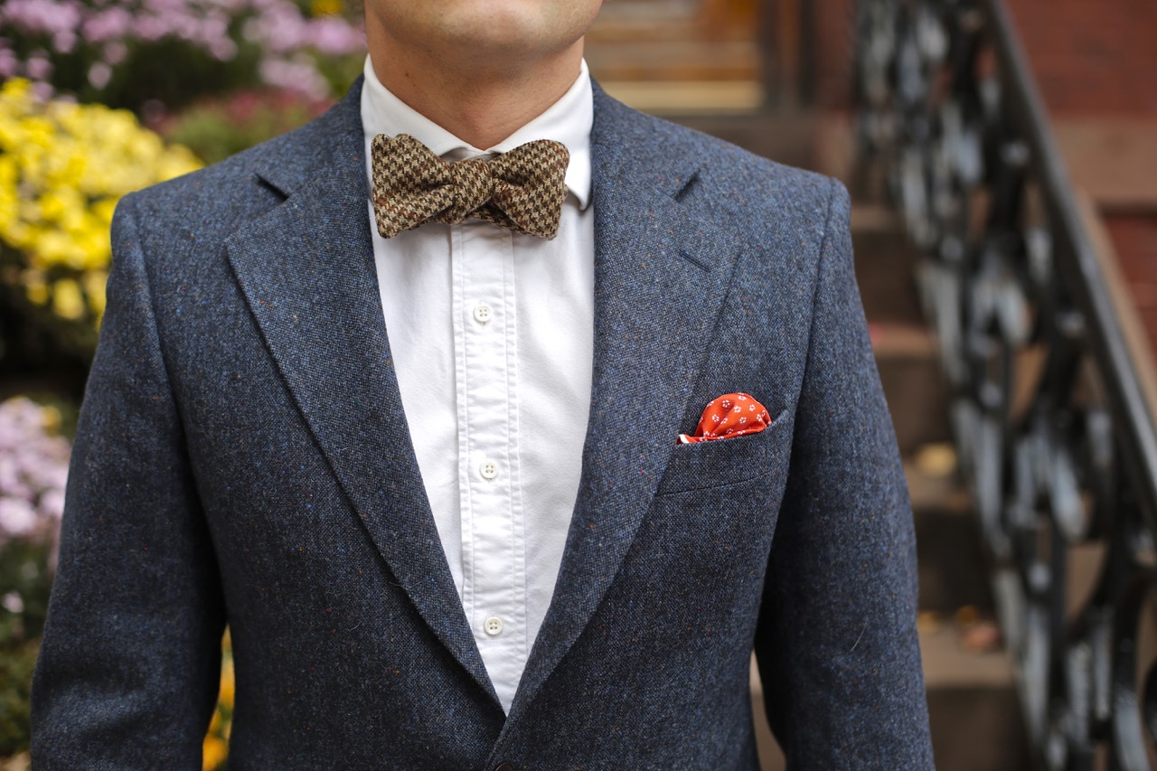 blue donegal tweed suit and bow tie